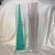 This pair of striking 1993 Shlomi Haziza geometric acrylic tower sculptures features vibrant teal and purple op-art...
