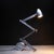 ABOUT This rare 1980s French postmodern "Aha" table lamp, designed by Olivier Verlet for Demeter, features an ingenious...