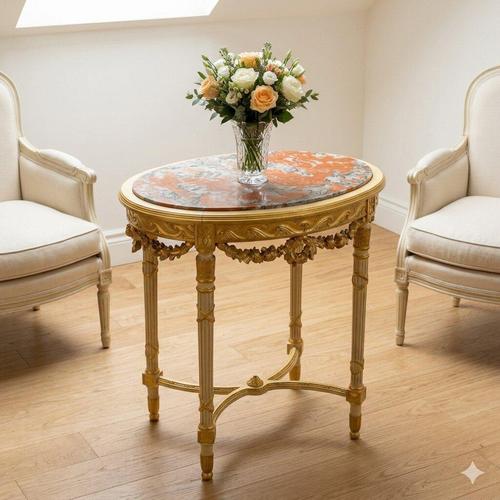 Neoclassical-style center table, carved, lacquered, and gilded. Recessed oval marble top, carved band embellished with...