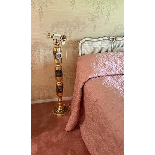 Striking vintage brass pedestal telephone labeled “Model Majesty,” dated July 1969 and made in Japan. A dramatic Hollywood...