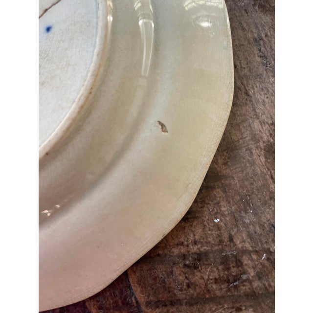 Fabulous old Chinese stoneware plate, that was intended for export, presented on stoneware with a soft white glaze, it...