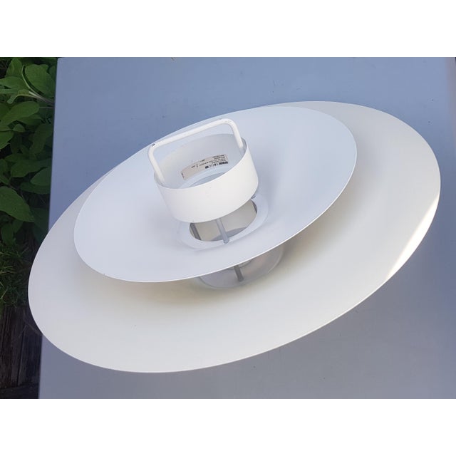 very elegant pendant made by the famous danish manufacturer Lyfa in the 70's. Model Desiree, in very good condition. It...