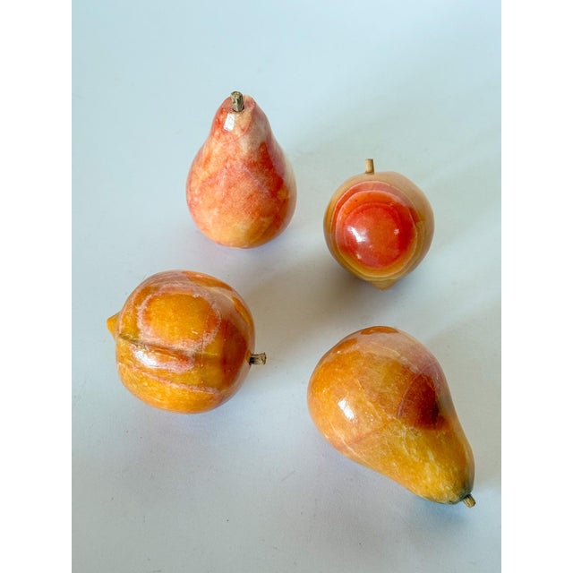 Vintage peach colored Italian fruits, set of four. Two pears and two peaches. They are in a lovely range of the same...
