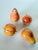 Vintage peach colored Italian fruits, set of four. Two pears and two peaches. They are in a lovely range of the same...