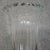 Large crystal vase signed Daum France, decorated with fine vertical ribs extending to an elegant, undulating, and...