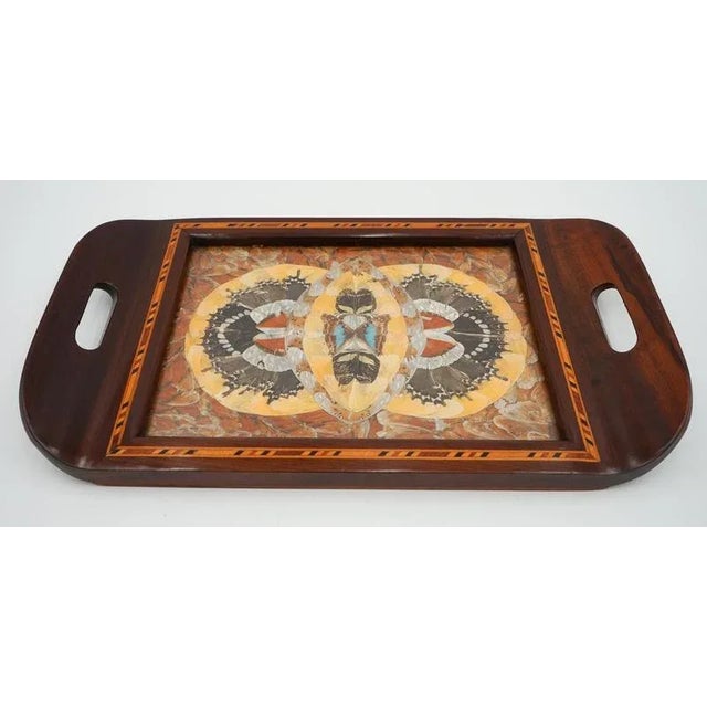 What makes this piece truly special is its unique backstory. According to the attached note, this tray was handmade by a...