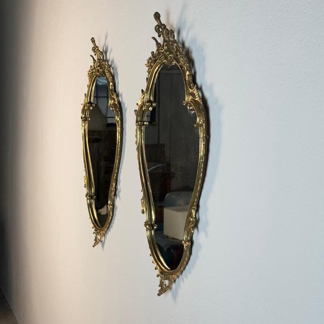 A refined pair of wall mirrors in the louis xvi style, crafted in florence by a skilled artisan workshop and entirely made...