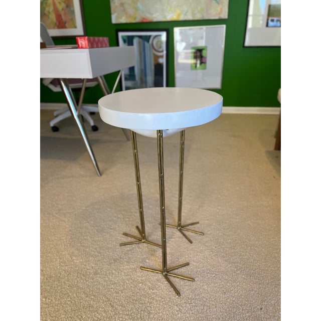 Handcrafted wooden top drink table. A heavy white wooden top with three metal legs. This table has bird feet. Table signed...