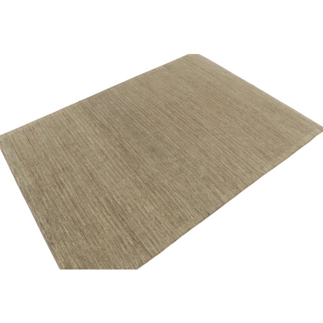 Description: Hand-knotted in wool, a 9x12 contemporary rug joining the most forgiving of Rug & Kilim’s new and modern...