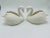 So graceful and pretty, this pair of swans is made by Fitz and Floyd! Ceramic in white with pink beaks