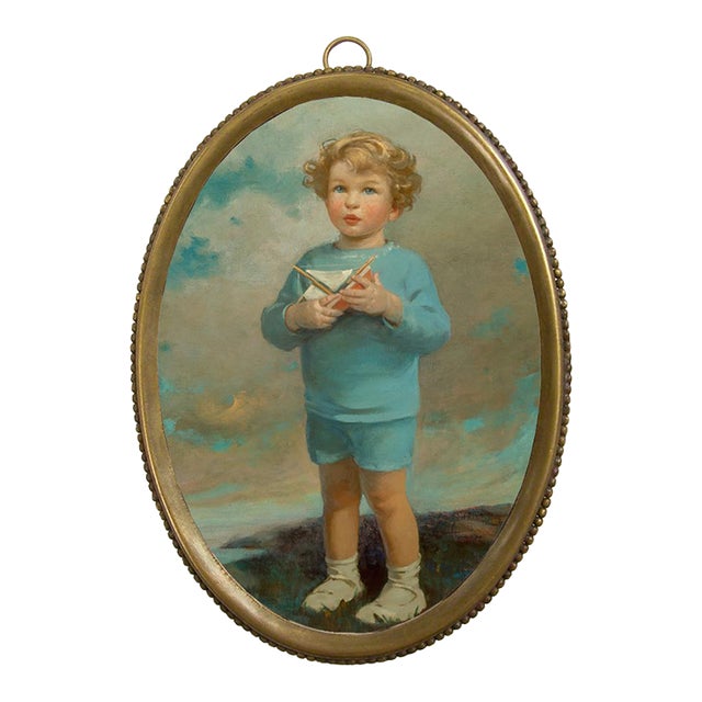 Young Boy With Sailboat in Antiqued Beaded Brass Frame For Sale