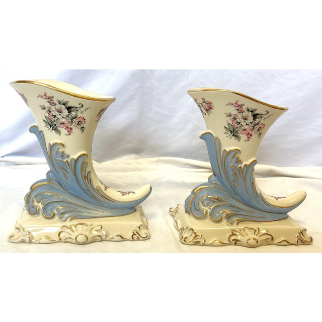 Classic porcelain cornucopia vases from the mid 20th century. They are styled after the 19th century French Belle Epoque...