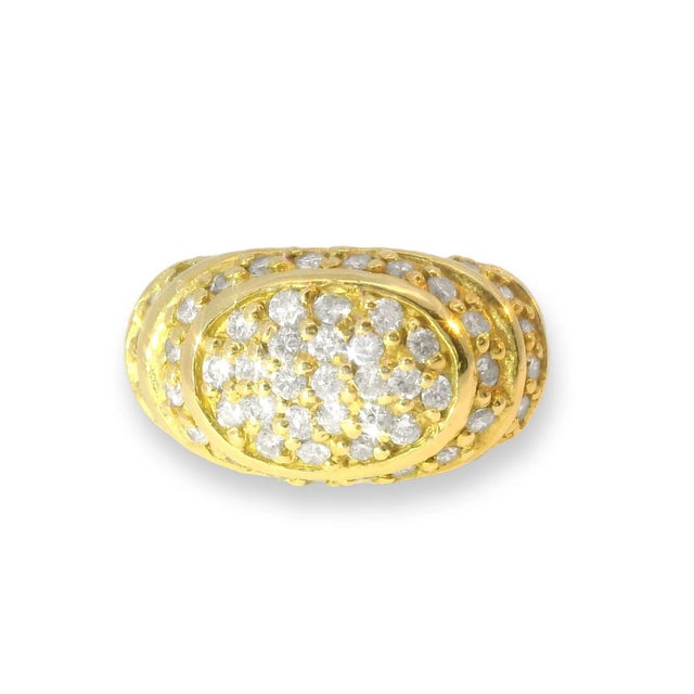 Elegant 14K yellow gold tiered dome ring featuring numerous brilliant round diamonds totaling 1 carat for a bold,...