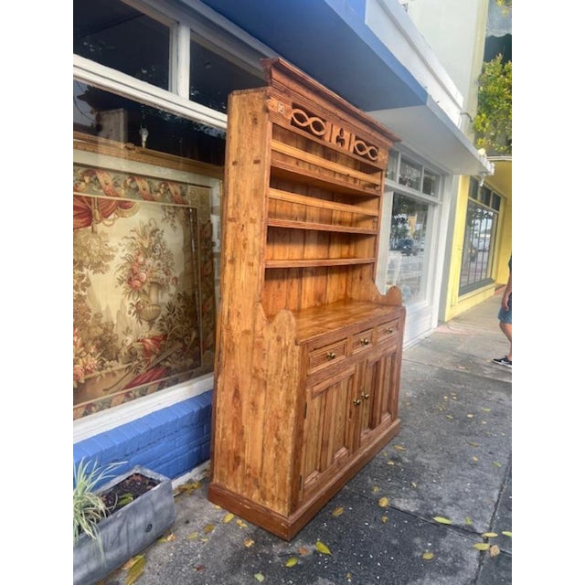 Discover the charm of a Large Antique Pine Irish Dresser, a piece that seamlessly blends functionality with the warmth of...