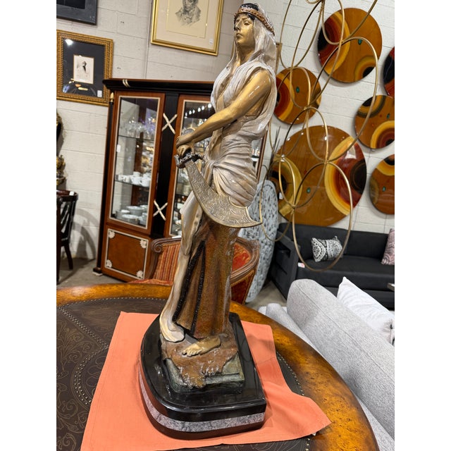 A striking embodiment of Art Nouveau elegance, this “Judith” statue after Emmanuel Villanis captures the theatrical grace...