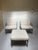 This is a 3-piece outdoor lounge set, which includes two lounge chairs plus an ottoman. The set is attributed to Brown...