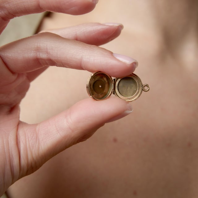 A romantic Victorian treasure, this 14k rose gold locket glows with warmth and antique character. At its center rests a...