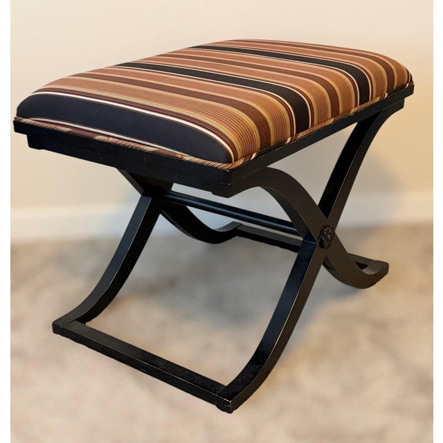 Add a sophisticated architectural statement to your space with this authentic, discontinued Port 68 Curule X-Bench....