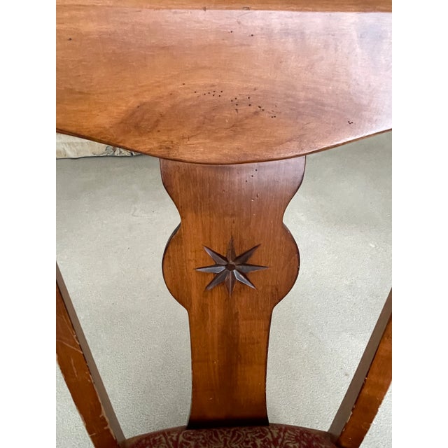 A mix of historical design influences and contemporary spirit comes together in these Country Crossings chair by Ethan...