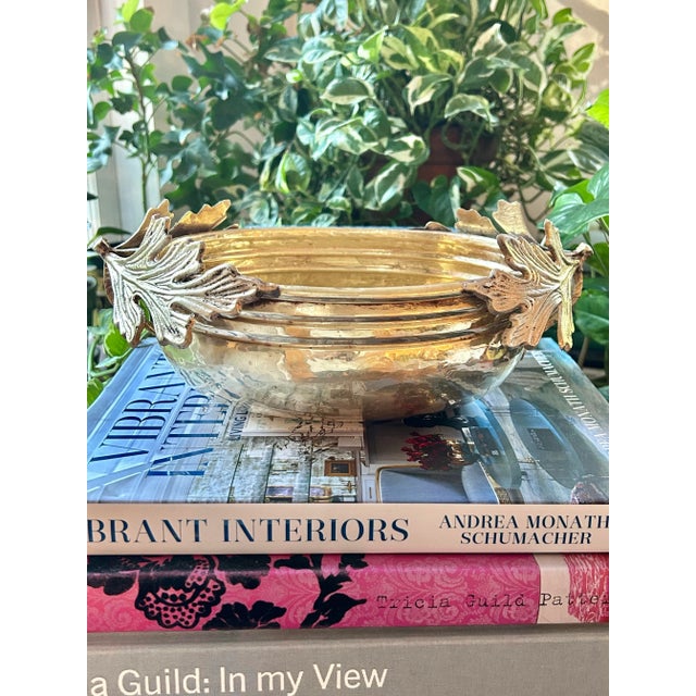 This oval brass cache pot or indoor planter is by Hosley, importer of decorative brass pieces for the home. The hammered...