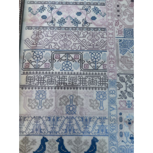 Beautifully made sampler. Very fine work on fine cloth. In excellent condition. Antiqued silver and gold frame.