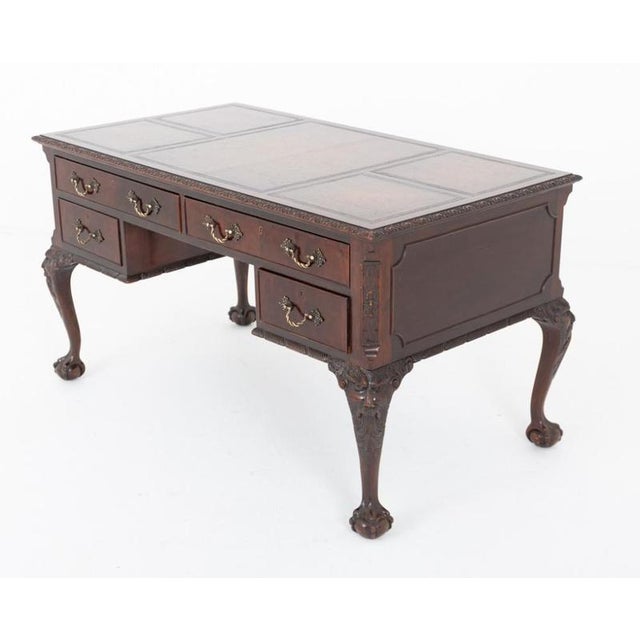 Superb mahogany writing desk beautifully crafted in the Chippendale style Raised on elegant cabriole legs terminating in...