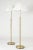Pair of beautiful brass floor lamps by Josef Frank, made from brass with wide pleated shades. Decorative screws used for...