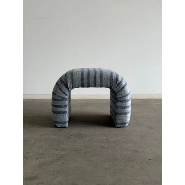 W26.5 D19.5 H18.75 Handcrafted in house. Upholstered in a deadstock blue striped fabric. Compact and comfortable, this...