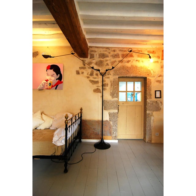 Constructed with two O.C.White articulating arms from 1920s, this floor lamp stands with industrial grit and poetic...