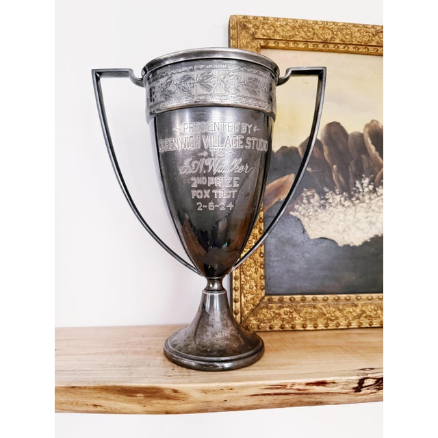 A lovely antique circa 1924 silver plated trophy dance contest trophy from a dance studio in the historic Greenwich...