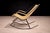 Carlo Hauner, Brazil, c. 1950s. This rocking chair reframes Hauner’s interest in lightweight structure and organic line as...