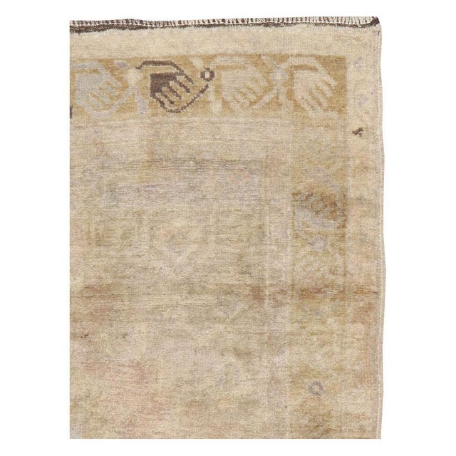 A vintage Turkish Oushak throw rug handmade during the mid-20th century with a muted and neutral color palette. Measures:...