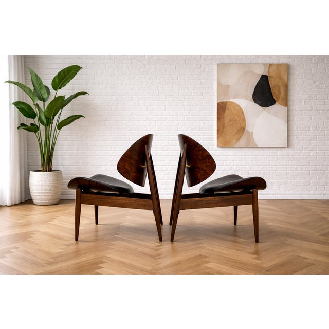 Striking pair of vintage Mid Century Modern Clam Chairs designed by Seymour James Wiener for Kodawood, c. 1960s. These...
