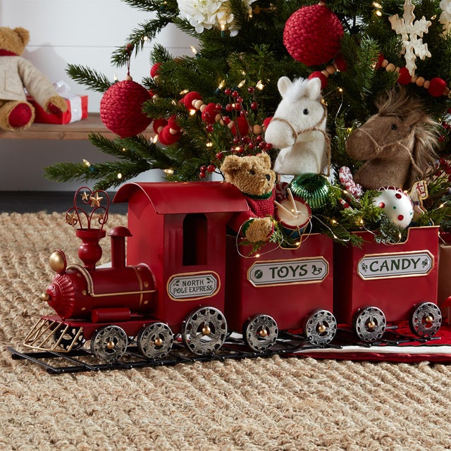All aboard the North Pole Express! This charming Toy Train Display adds a festive touch to your holiday decor with its...
