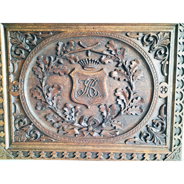 A finely carved 19th-century oak cabinet door panel, likely originating from Belgium and executed in the Neo-Renaissance...