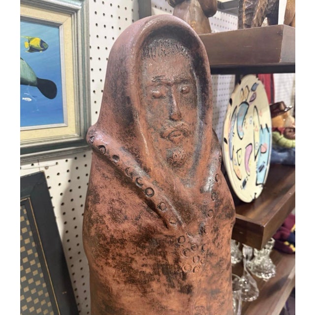 Vintage Large Clay Eskimo Sculpture 33in Tall Condition is Used. Excellent condition Sculpture has a beautiful brown and...