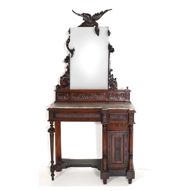 Toilet console in solid walnut, finely hand-carved, with top shaped grey marble. Very special processing that surrounds...