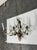Design Plus Gallery presents a Vintage Hollywood Regency Crystal Prism Five-Light Wall Sconce. This ornate electric...