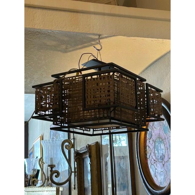Chic vintage Japanese flush mount chandelier crafted in metal in an Asian modern form with a plastic shade.