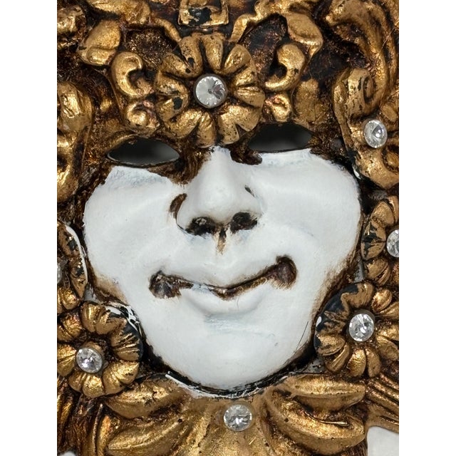 This ceramic mask was handmade by the Artisans of Casin dei Nobili, one of Venice's most prestigious Mask Makers. Made...
