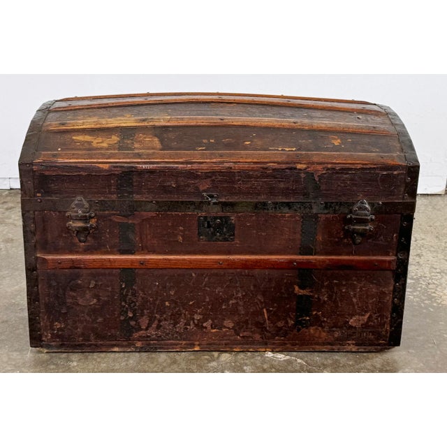 Late 19th Century antique domed Humpback steamer trunk. Leather handles to each end. Beautiful patina. Age appropriate...