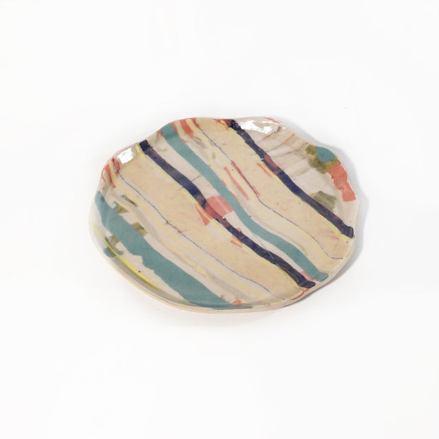 This plate is a one-off piece by Artist Victoria Gilles Fernández is made from stoneware clay. The pattern is achieved by...