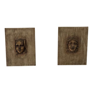 1970s Pair Of. Silver Leaf/Gold Faces Mounted on Board For Sale