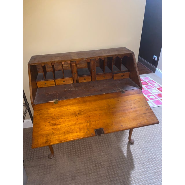 An exceptional and highly desirable Early American Queen Anne slant-front desk on frame, dating to the mid-to-late 18th...