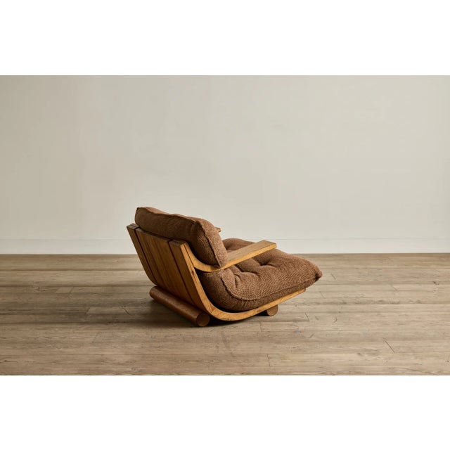 Rare! The Laziness Armchair (also known as Poltrona Preguiça) in solid wood with textured upholstery, designed by Amilcar...