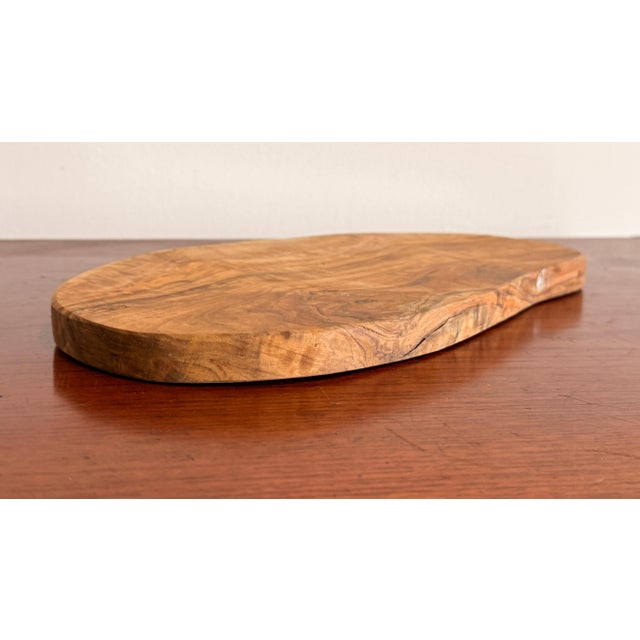Vintage solid olive wood small tray / cheese board. Measures 12" wide, 6.25" deep and .75" thick. Very good vintage...
