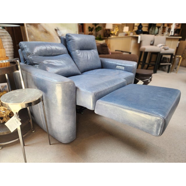 Chelsea Motion Loveseat Dimensions: 62"W x 39"D x 38"H Leather: Mont Blanc - Adriatic A lovely wrapped arm, tucked back,...