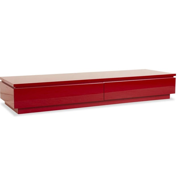 The Interlübke Cube sideboard comes in a vibrant red, brightening up any living space. Its numerous compartments provide...