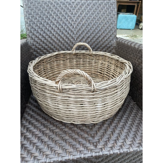 Large wicker basket in great shape. Has an aged patina, however it is not brittle. This basket is functional and can be...