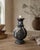 A wonderfully characterful antique Indian candlestick dating from the late 19th to early 20th century, circa 1890–1920....